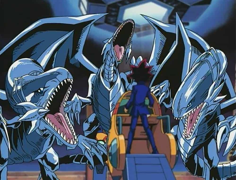 three blue eyes white dragons vs yami yugi first episode of yugioh